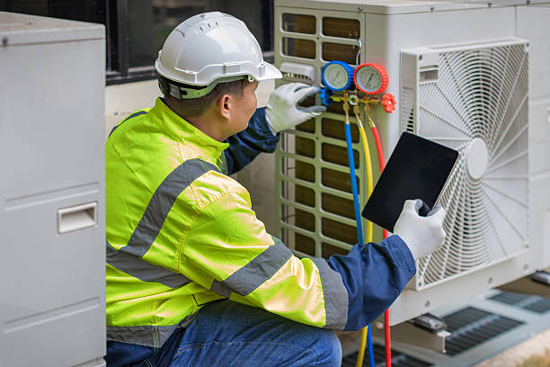Professional Hvac technician working in Helena, AL